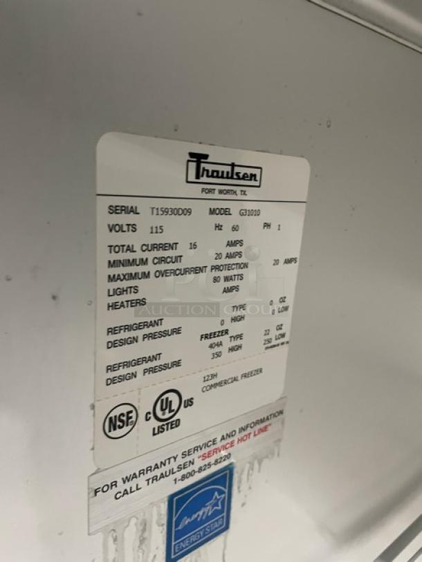 Traulsen G31010 commercial stainless steel triple door freezer, Energy Star certified, poly coated racks, on casters.