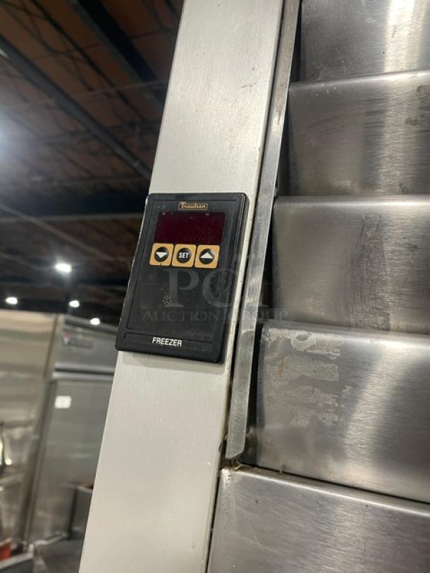 Traulsen G31010 stainless steel triple door reach-in freezer, Energy Star certified, digital control panel shown.