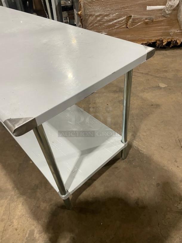L&J Commercial stainless steel worktop table with undershelf, on legs, scratch-n-dent condition.