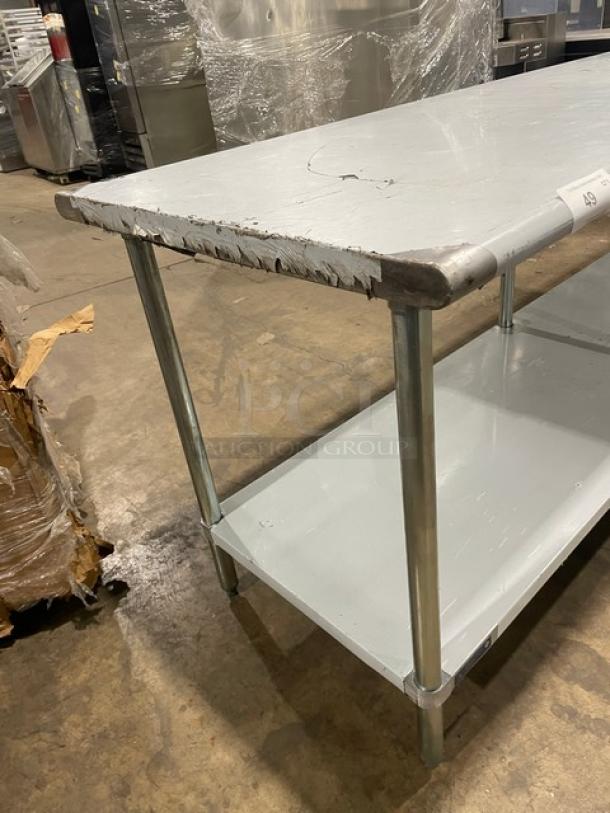 L&J stainless steel worktop table, single undershelf, on legs, scratch-n-dent condition, visible top edge wear.