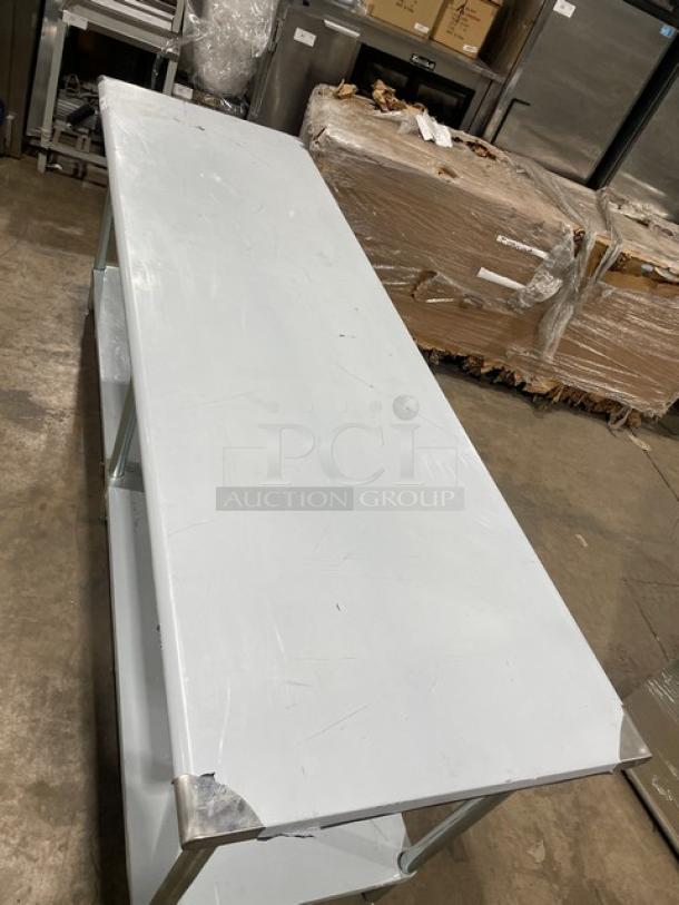 L&J Commercial Stainless Steel Single Undershelf Worktop Table, scratch-n-dent, on legs, new condition.