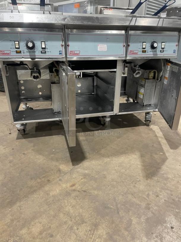 Pitco Frialator 2-bay deep fat fryer with center pan cabinet, backsplash, basket hanger, fry basket, stainless steel, on casters.