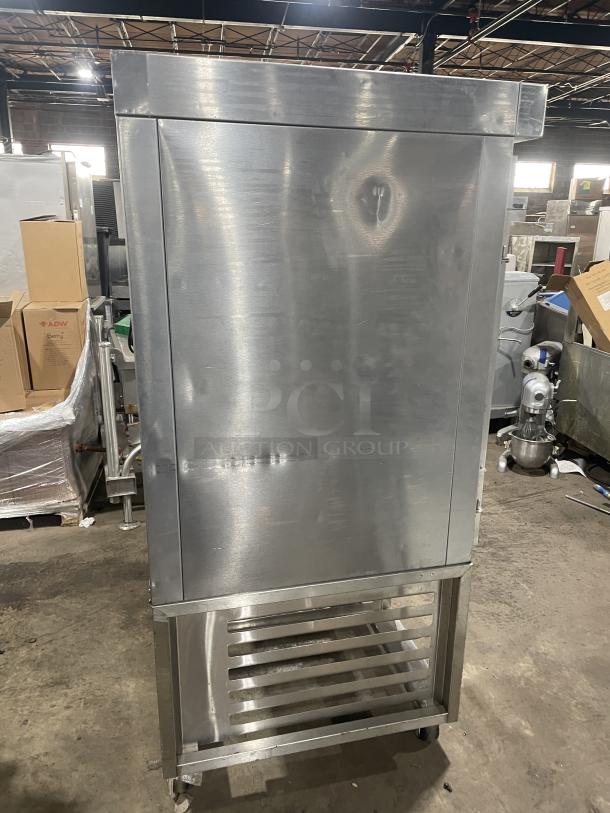 Baxter OV300G stainless steel gas mini rotating-rack convection oven, digital control, 8-pan rack, open-base stand, on casters.