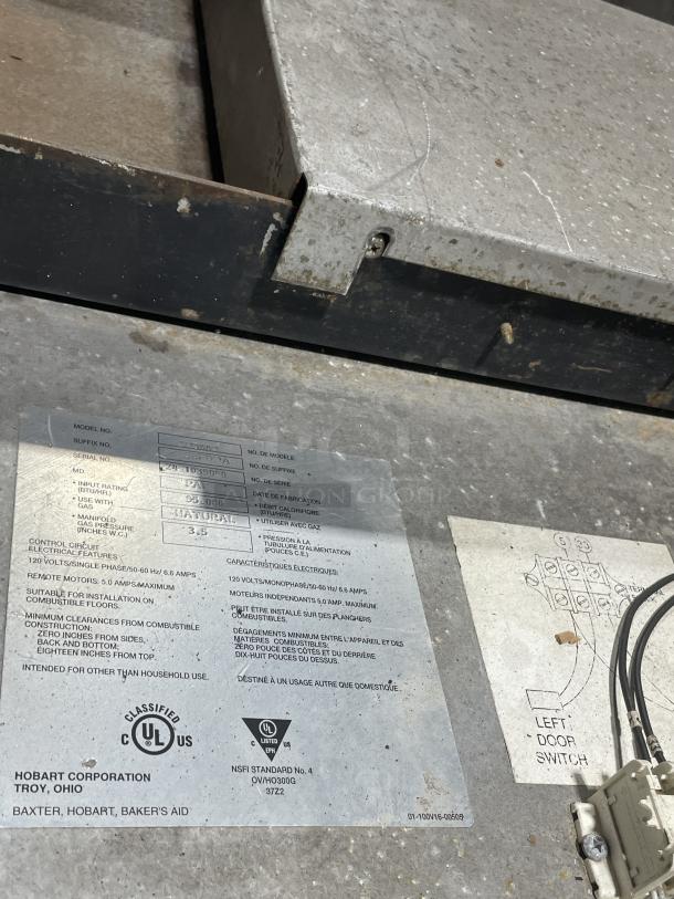 Baxter OV300G stainless steel convection oven tag, detailing model, serial number, power ratings, and safety standards.