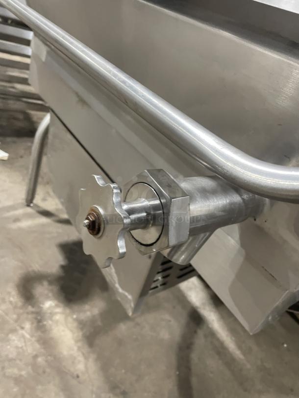 Groen 40 Gal. Stainless Steel Gas Tilted Braising Pan on legs. Visible valve handle and sturdy construction. Excellent condition.