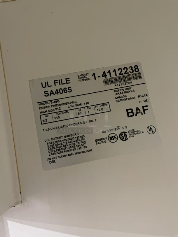 True T-Series T-49G refrigerator label, showing model, serial number 1-4112238, 115V, 1 phase, and NSF certification.