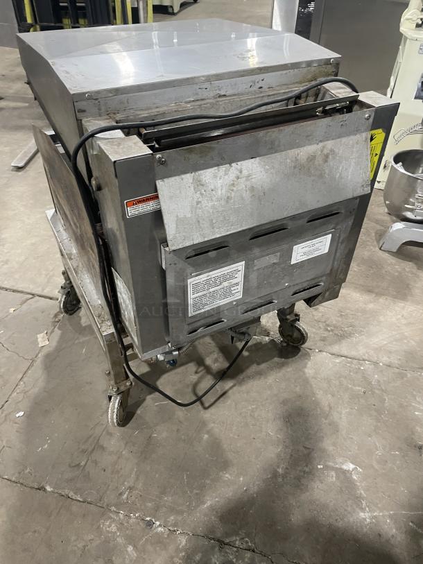 Lang Commercial Stainless Steel Infrared Clamshell Griddle, Model 224TH-NATMG, on equipment stand with casters, natural gas powered.