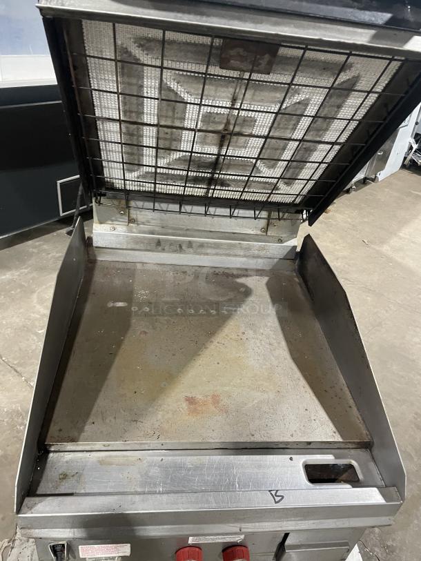 Lang stainless steel infrared clamshell griddle, model 224THNATMG, natural gas, countertop unit with casters, used condition.