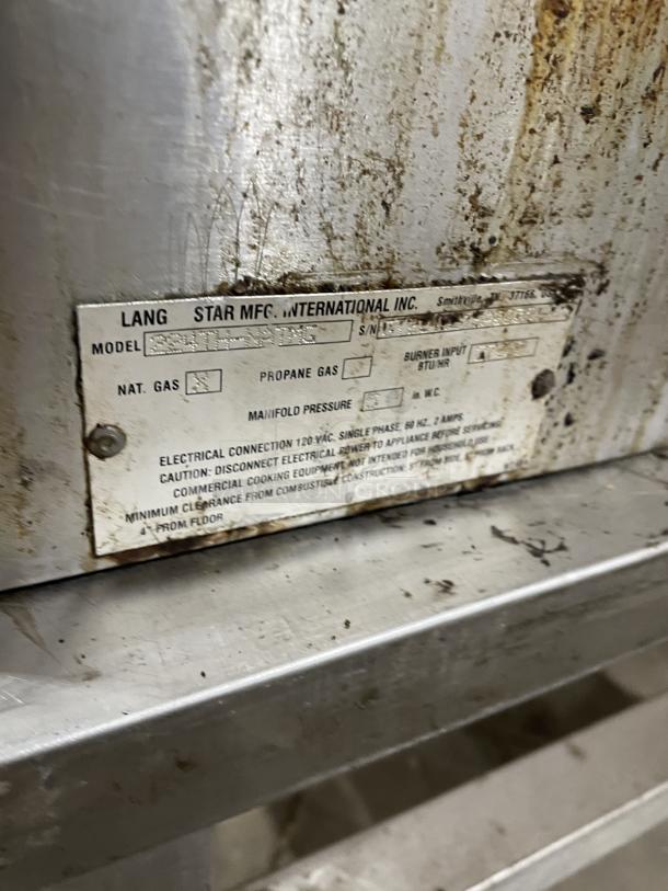 Lang 224TH-NATMG stainless steel natural gas countertop clamshell griddle on casters, with equipment stand. Visible wear and model label.