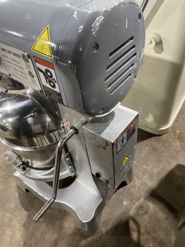 Black Diamond BDPM20 20 Qt. Planetary Mixer with stainless steel bowl, bowl guard, and flat beater. Model BDPM-20, SN 1908200, 120V, 1 Phase, on legs. Visible wear and caution labels on housing.