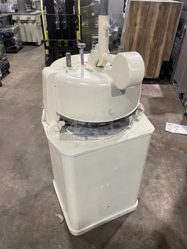 Rompa commercial white electric dough rounder/divider with rounding plate, freestanding, shown in used condition.