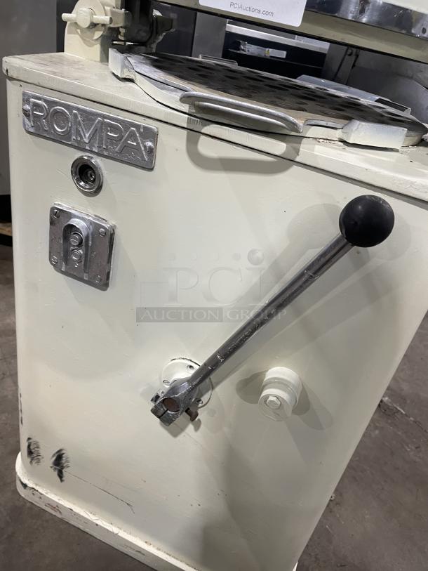 Rompa commercial white electric dough rounder/divider with rounding plate, features Rompa branding, in working condition.