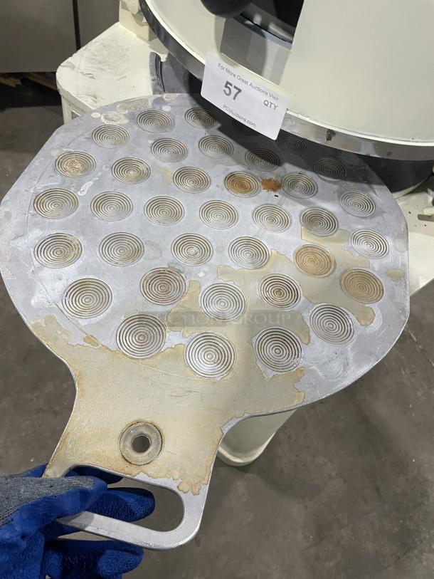 Rompa white electric dough rounder/divider with rounding plate, showing wear. Auction tag 57 present.