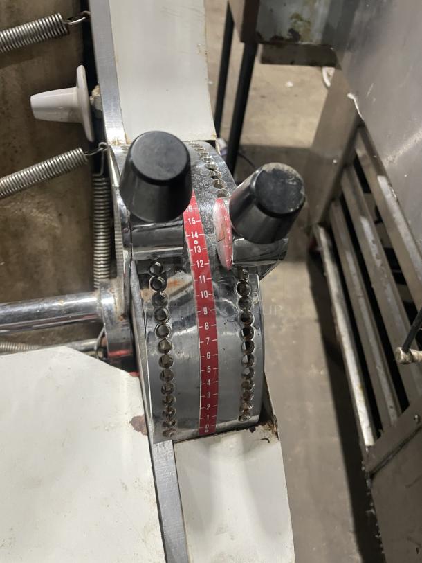 Merand Tenor 2 electric dough moulder, white finish, adjustable settings, used condition, 220V power, working when removed.