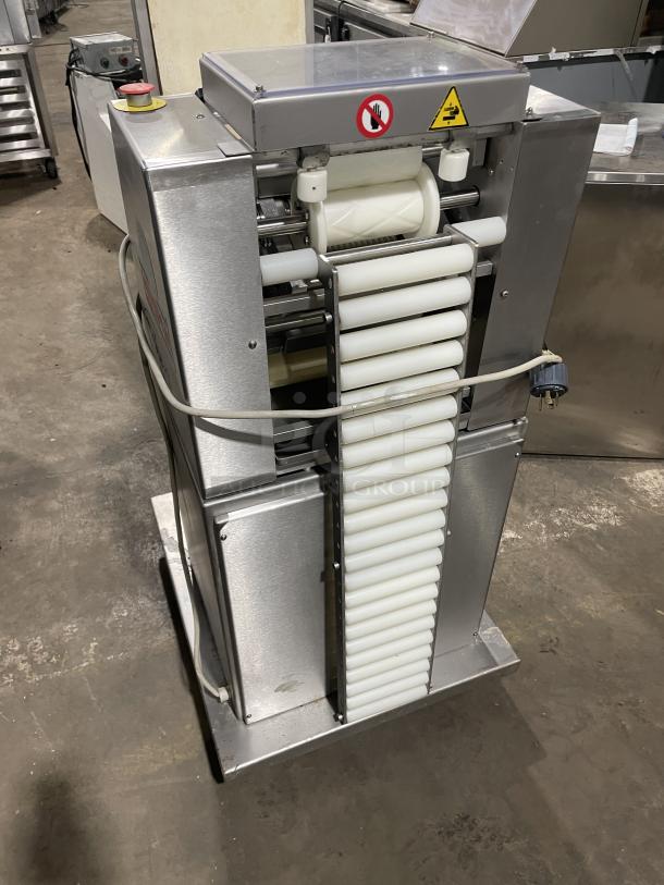 Minipan MGX commercial stainless steel dough sheeter with conveyor, 220V 3 Phase, on casters, working condition.