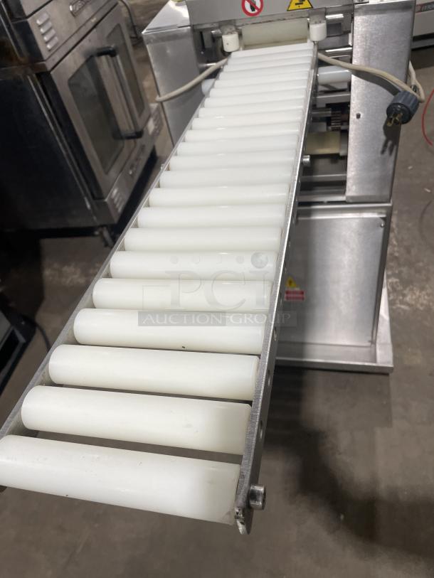 Minipan MGX stainless steel dough sheeter with conveyor, 220V 3-phase, floor model on casters, working condition.