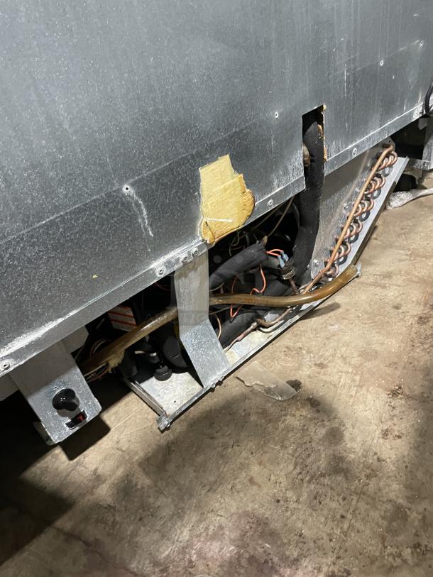 Delfield stainless steel refrigerated prep table with overhead storage and cutting board. Model UCD4464N-12-DD5, 115V.