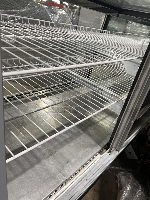 Marc SQBCR59 59" refrigerated bakery display case, wooden style, flat glass, poly coated wire rack, sliding doors.