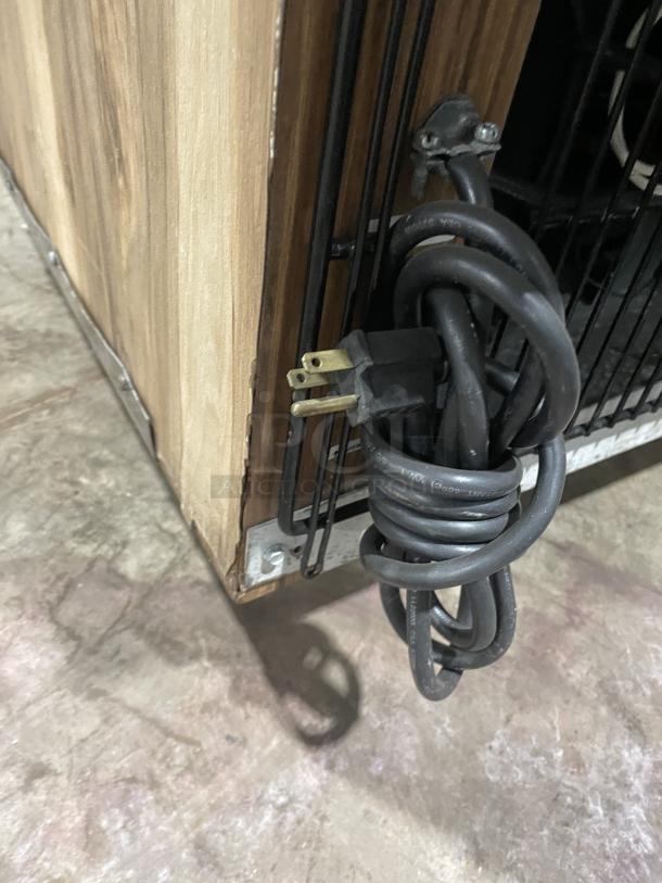 Marc wooden 59" flat glass refrigerated bakery display case, model SQBCR-59, with poly coated rack and rear glass doors.