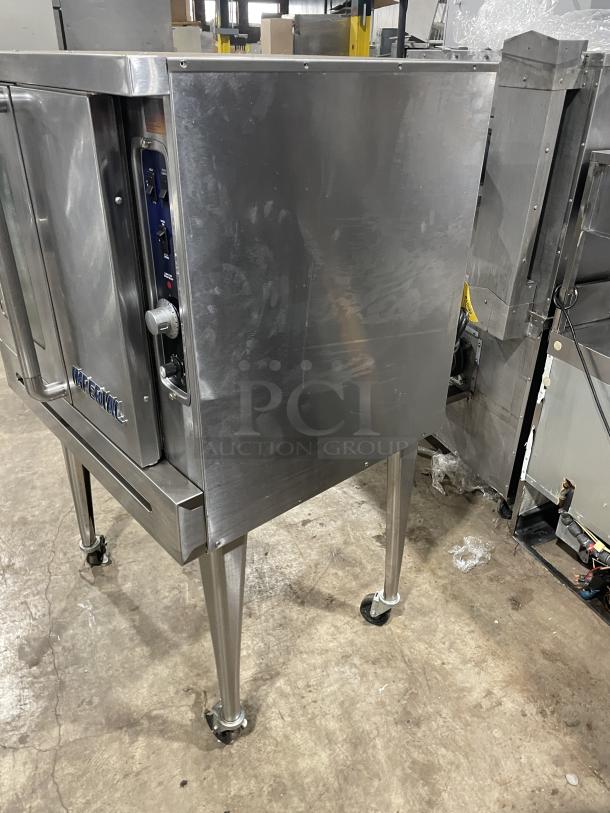 Imperial PCVG1 stainless steel convection oven, natural gas powered, single-stack, on casters, with wired oven rack.