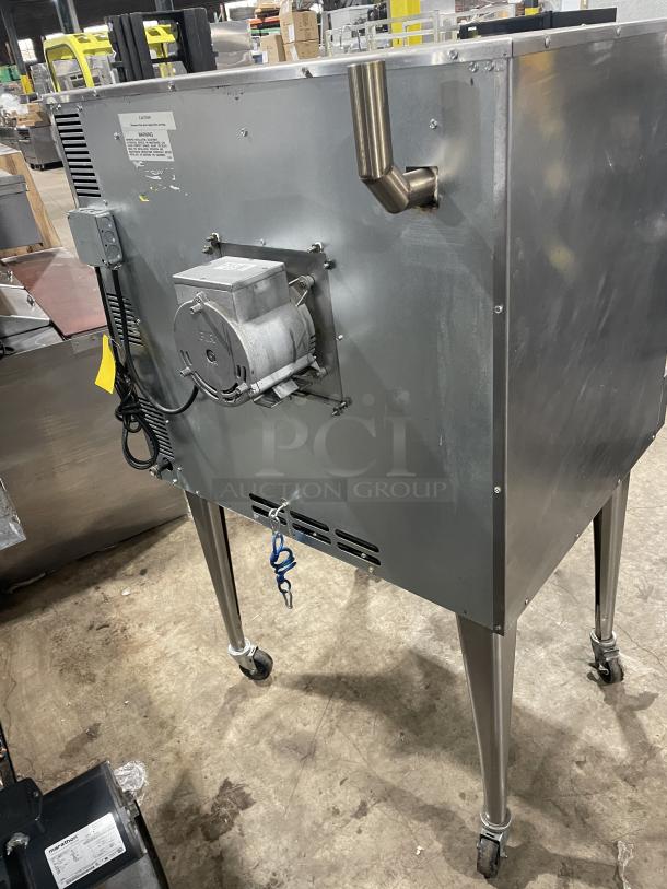 Imperial PCVG1 stainless steel convection oven on casters, showing back view with motor and exhaust. Model: PCVG-1, SN: 08159322.