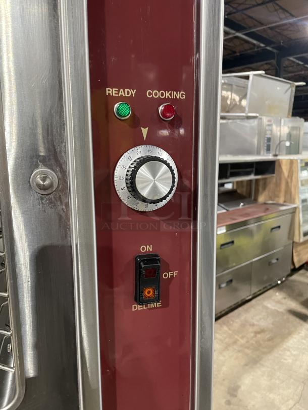 Crown GSX-10HE steamer control panel with ready/cooking lights and timer dial, showing on/off switch.