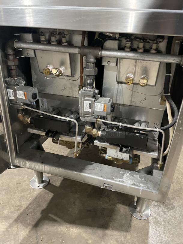 Crown GSX10HE stainless steel natural gas convection steamer with dual compartments, built-in pan racks, and individual controls.