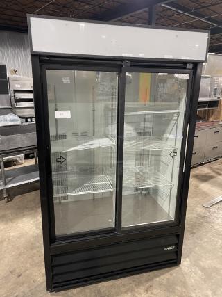 Habco Eagle Series ESM42 black 2-door glass reach-in refrigerator merchandiser with poly-coated rack, on legs, model SN: 42007345.