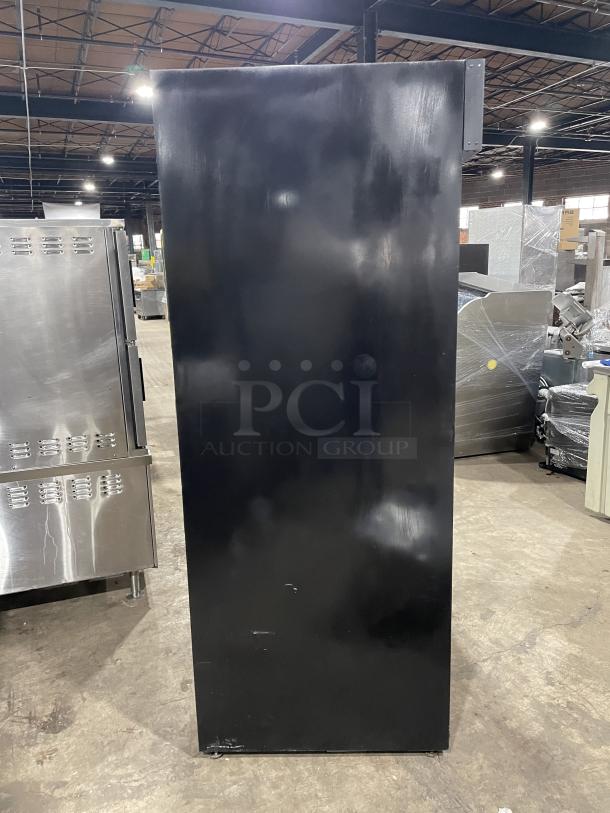 Habco Eagle Series ESM42 commercial black 2-door glass refrigerator, model ESM42, with poly coated rack, on legs.