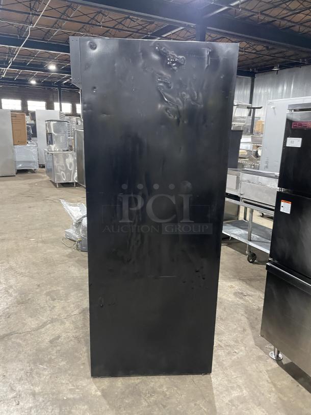 Habco Eagle Series ESM42 black 2-door glass reach-in refrigerator merchandiser, visible wear, poly-coated rack, on legs.