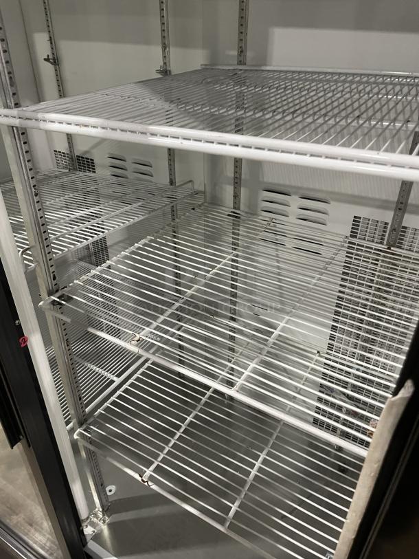 Habco Eagle Series ESM42 black 2-door glass refrigerator merchandiser with poly coated racks, SN: 42007345, 115V 1 Phase.