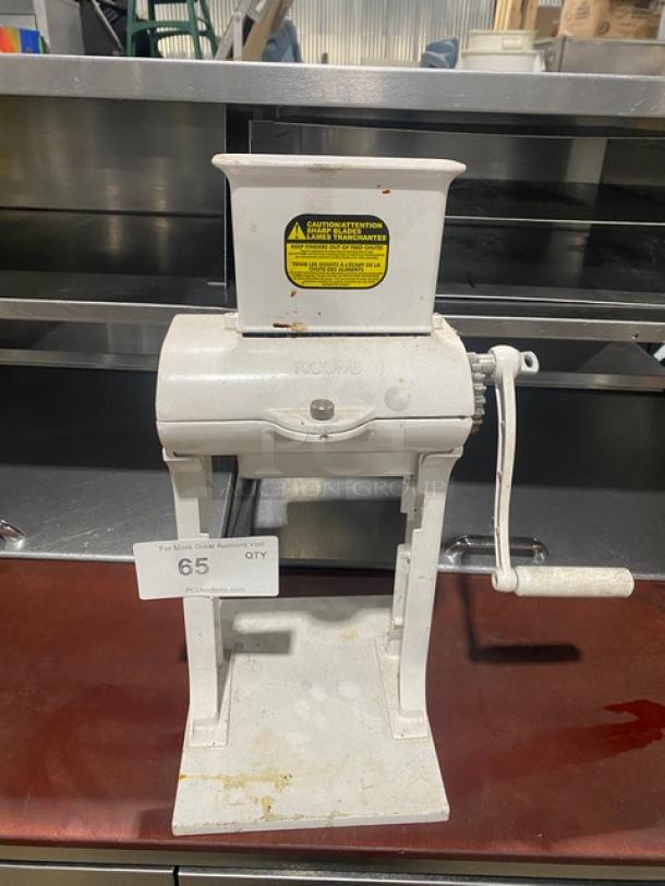 Weston Commercial White Cast Aluminum Manual Meat Cuber/Tenderizer with crank bar, countertop model, visible safety label.