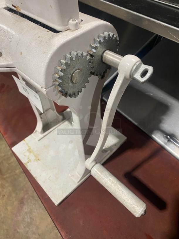 Weston commercial white cast aluminum manual meat cuber/tenderizer with crank bar, in good condition, countertop model.