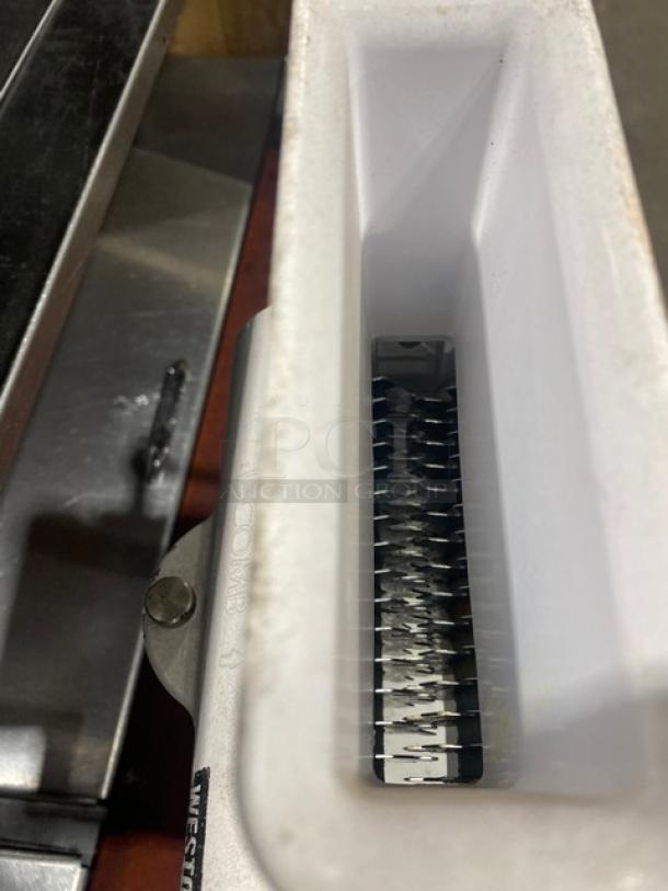 Weston Commercial White Cast Aluminum Meat Cuber/Tenderizer with crank bar, visible blades, sturdy construction, countertop model.