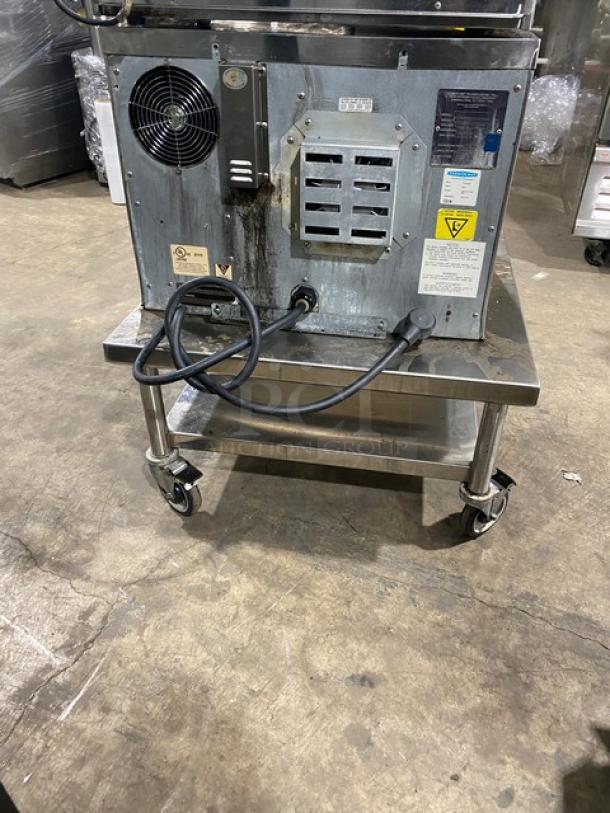 TurboChef NGC commercial stainless steel rapid cook oven, digital controls, on equipment cart, ventless, 208/240V, used condition.