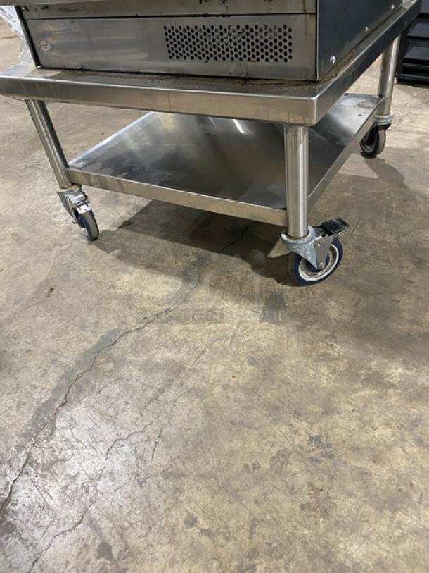 TurboChef NGC commercial countertop rapid cook oven on stainless steel undershelf cart; ventless design, digital controls, 208/240V.