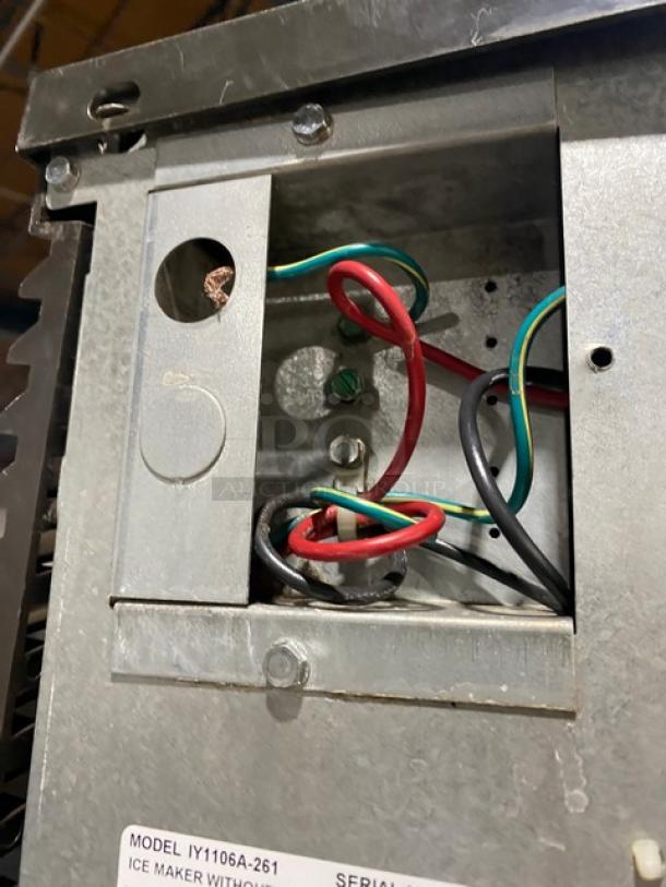 Manitowoc Indigo NXT IY1106A-261 ice machine interior wiring. Includes model and serial number tags.