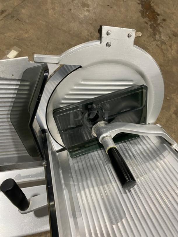 Bizerba stainless steel electric meat slicer, countertop model, heavy duty, 120V, SN: 22-12929, excellent condition.