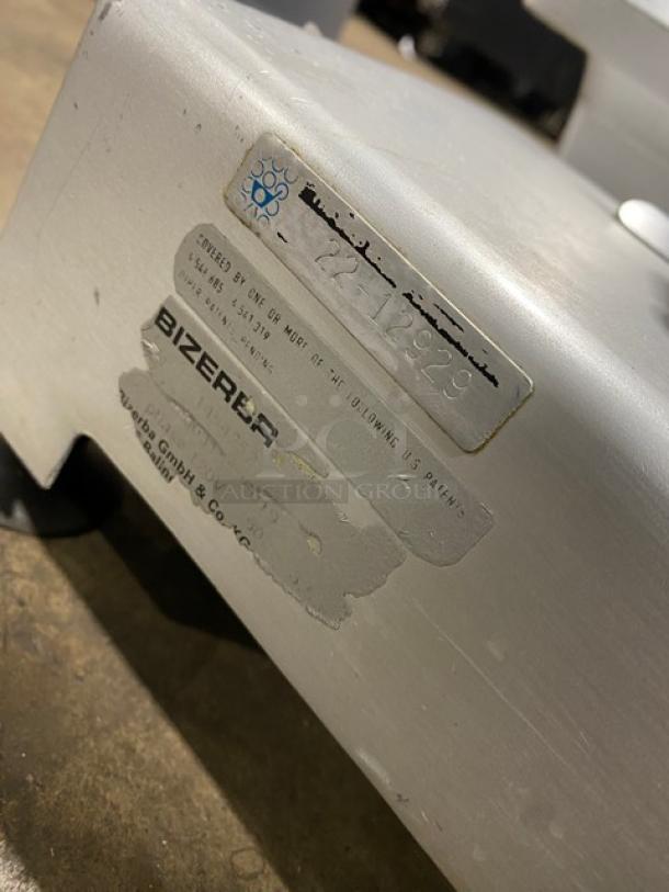 Bizerba commercial stainless steel electric deli slicer, SN: 22-12929, 120V, heavy duty, used condition, visible brand label.