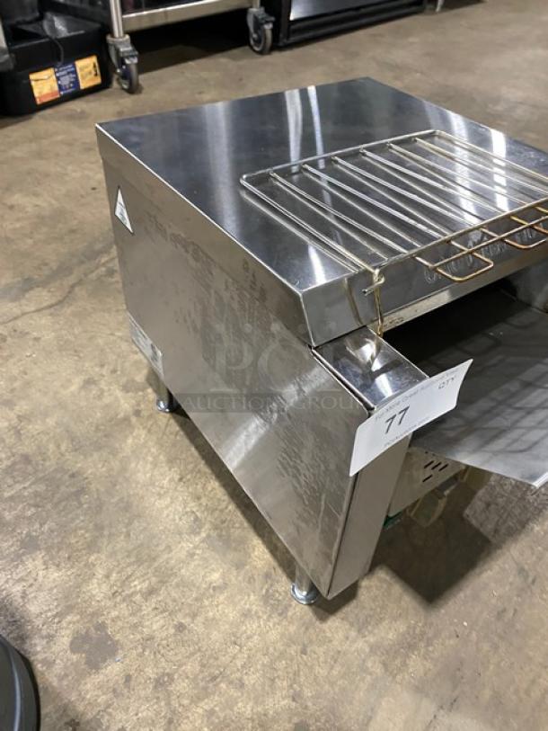 Ava Toast TT300208 countertop conveyor toaster, stainless steel, electric, 208V, on legs, commercial use, good condition.