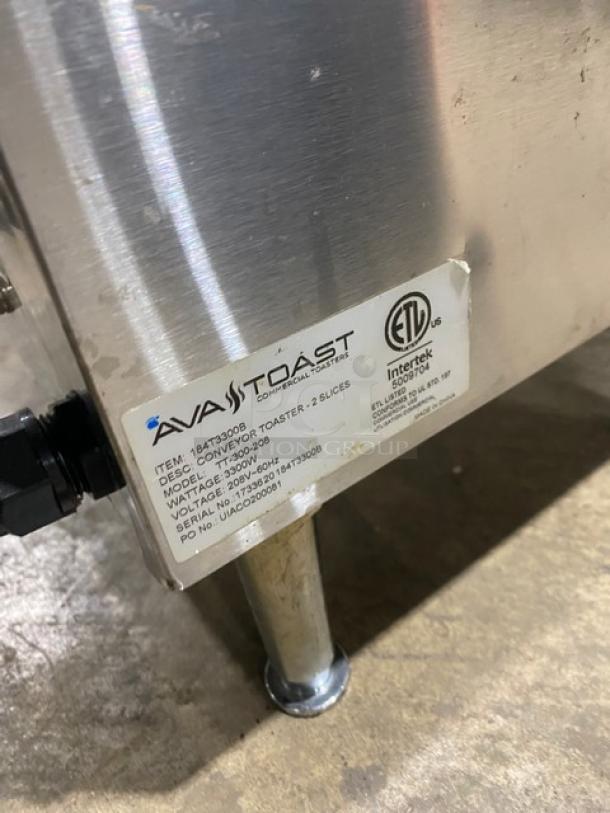 Ava Toast TT300208 conveyor toaster, stainless steel, electric, on legs, ETL certified label visible, model and serial number displayed.