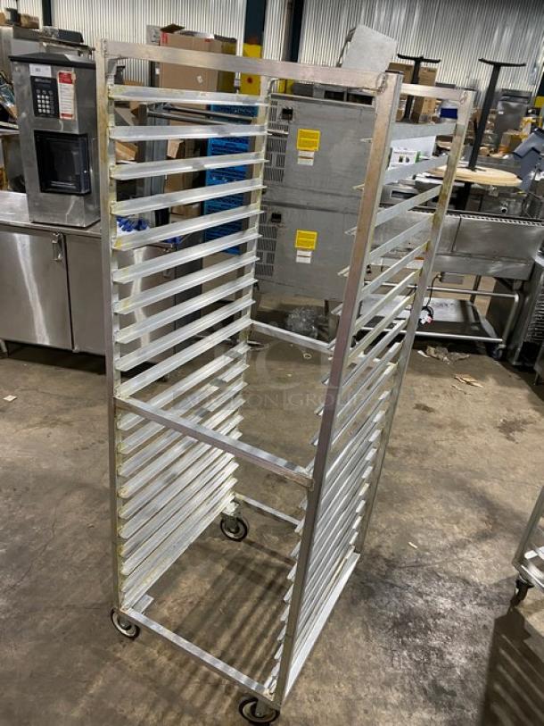Commercial aluminum heavy-duty bun/sheet pan rack on casters, 20 tiers, sturdy frame, in good condition for industrial use.