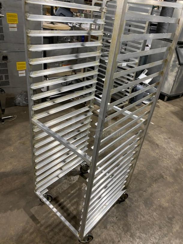 Commercial aluminum heavy-duty bun/sheet pan rack on casters, excellent condition, 20 slots, durable and mobile design.