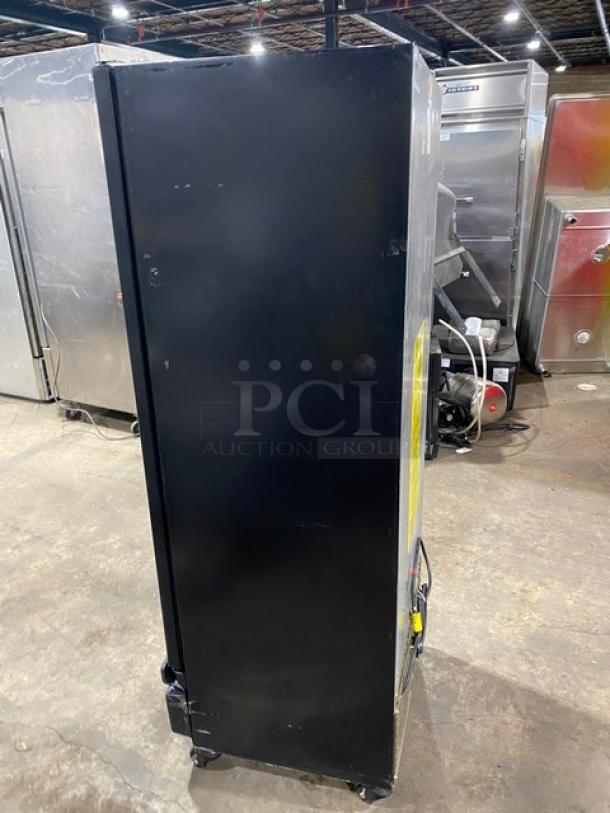 Imbera VR12R2 commercial black single glass door cooler, poly-coated wire rack, on casters, 115V 1 Phase, used condition.