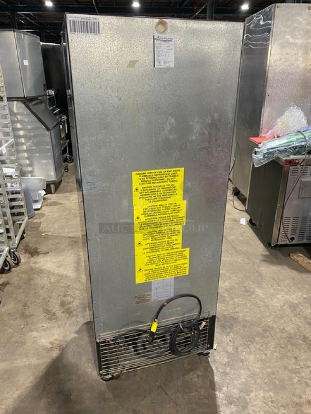 Imbera VR12R2 commercial reach-in cooler, single glass door, poly-coated wire rack, 115V, on casters. Model SN: A70170601656.