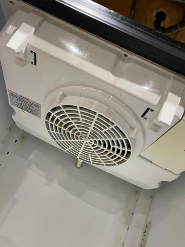 Imbera VR12R2 cooler interior fan view, showing white poly-coated wiring and ventilation grill.