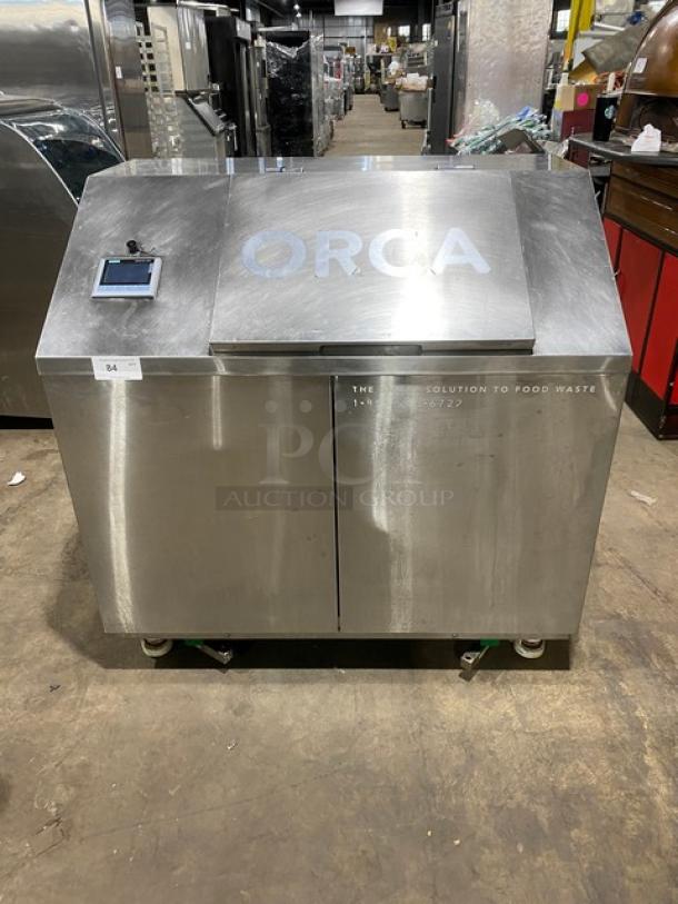 ORCA stainless steel food waste digester with on-board scale, touchscreen interface, and casters. Electric, 120V.