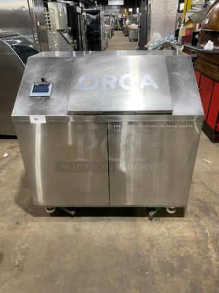 ORCA stainless steel food waste digester with on-board scale, touchscreen interface, and casters. Electric, 120V.