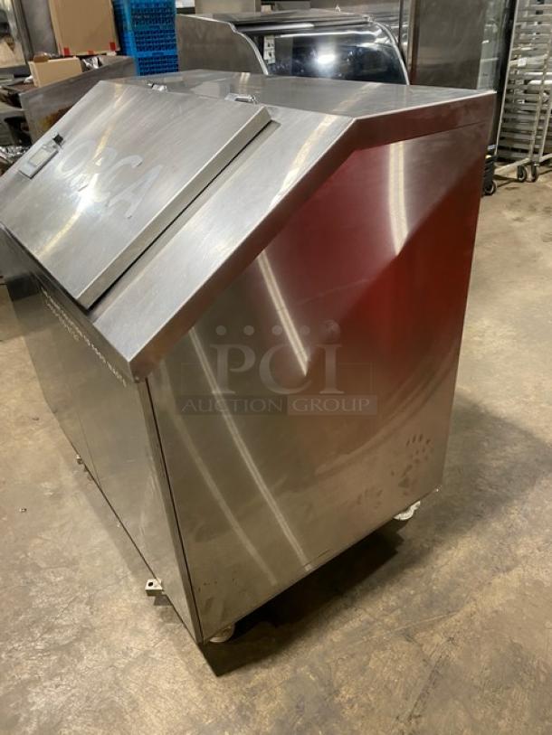 ORCA commercial stainless steel electric food waste digester, with on-board scale, touchscreen interface, and casters, 120V.