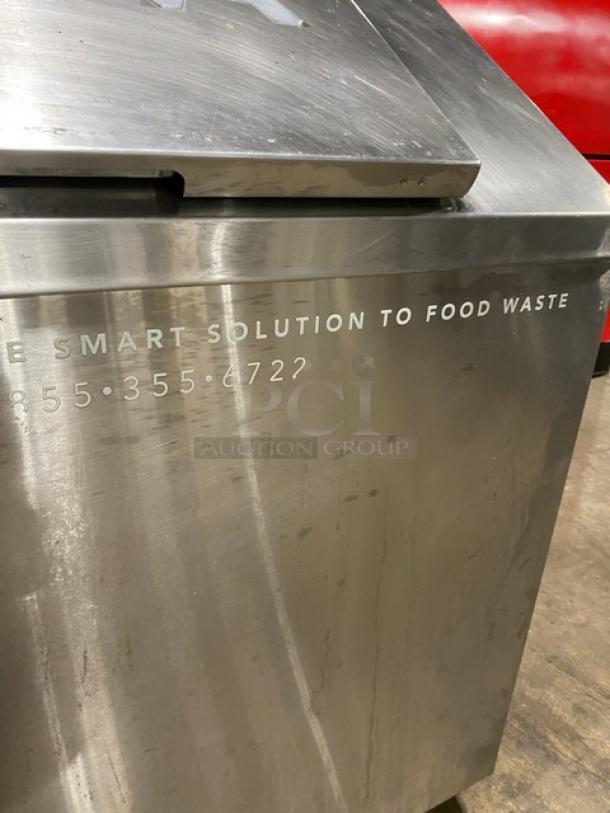 ORCA stainless steel electric food waste digester, features on-board scale, touchscreen, 120V, on casters, commercial use.